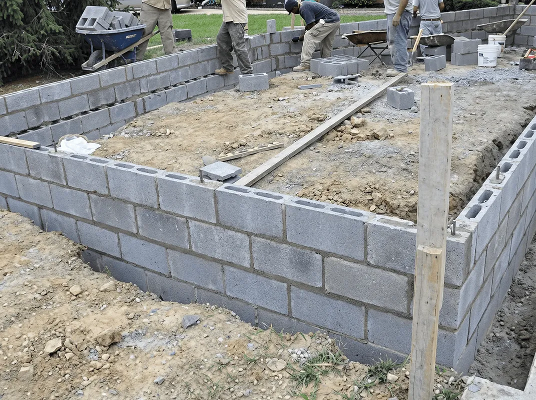 Professionals building a foundation with blocks in Anaheim, CA