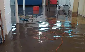 Basement with boiler, cabinets and washing machine completely flooded in Anaheim, CA